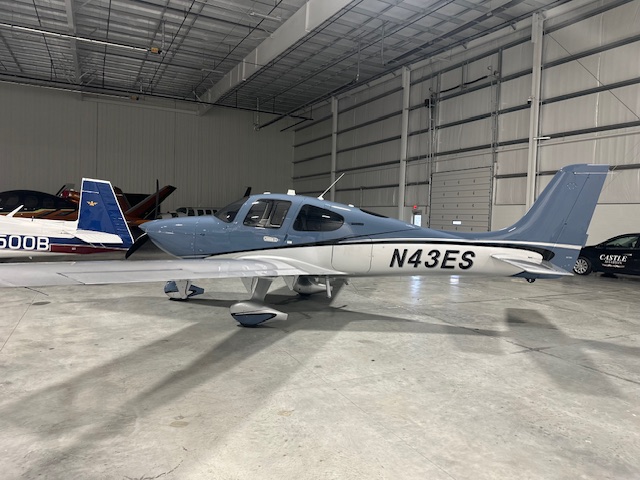 cirrus airplane in hangar